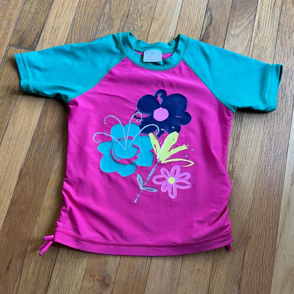 Hanna Andersson pink and green floral swim shirt